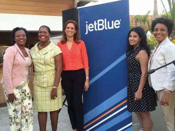 State Sen.  Linda Dorcena Forry, JetBlue’s Haiti General Manager Elsy Viala, Minster of Tourism Stephanie Villedrouin, JetBlue’s Manager of Sales and Marketing for Latin America and the Caribbean Elsa Espana, and Sandra Cazir, vice-consul of Haitit’s Boston consulate at Logan Airport last Wednesday. Photo by Bill Forry
